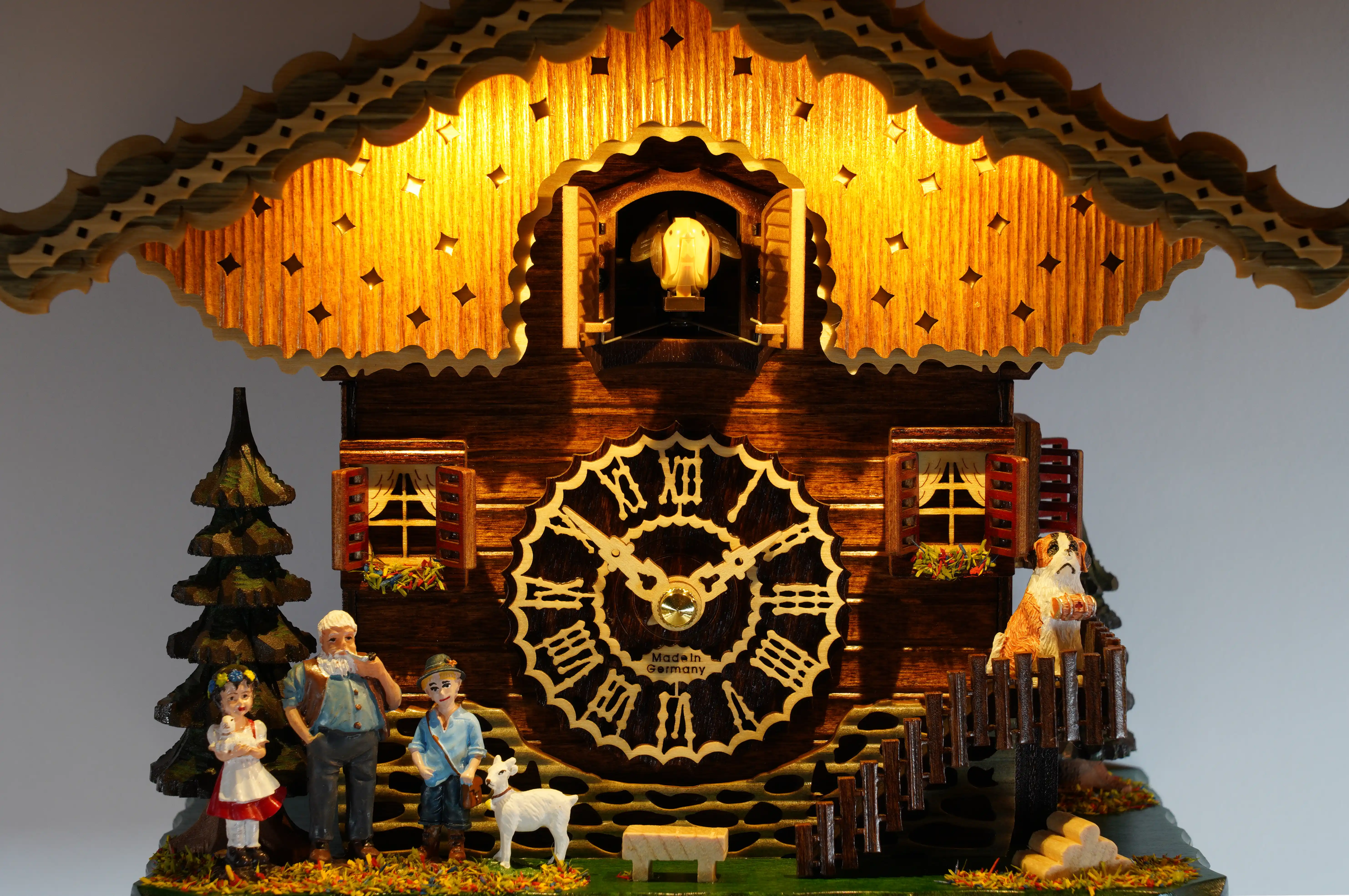 Chalet Battery Operated / Quartz Cuckoo Clock representing Heidi storyline and its characters, with LED lights, plays music, made by Trenkle