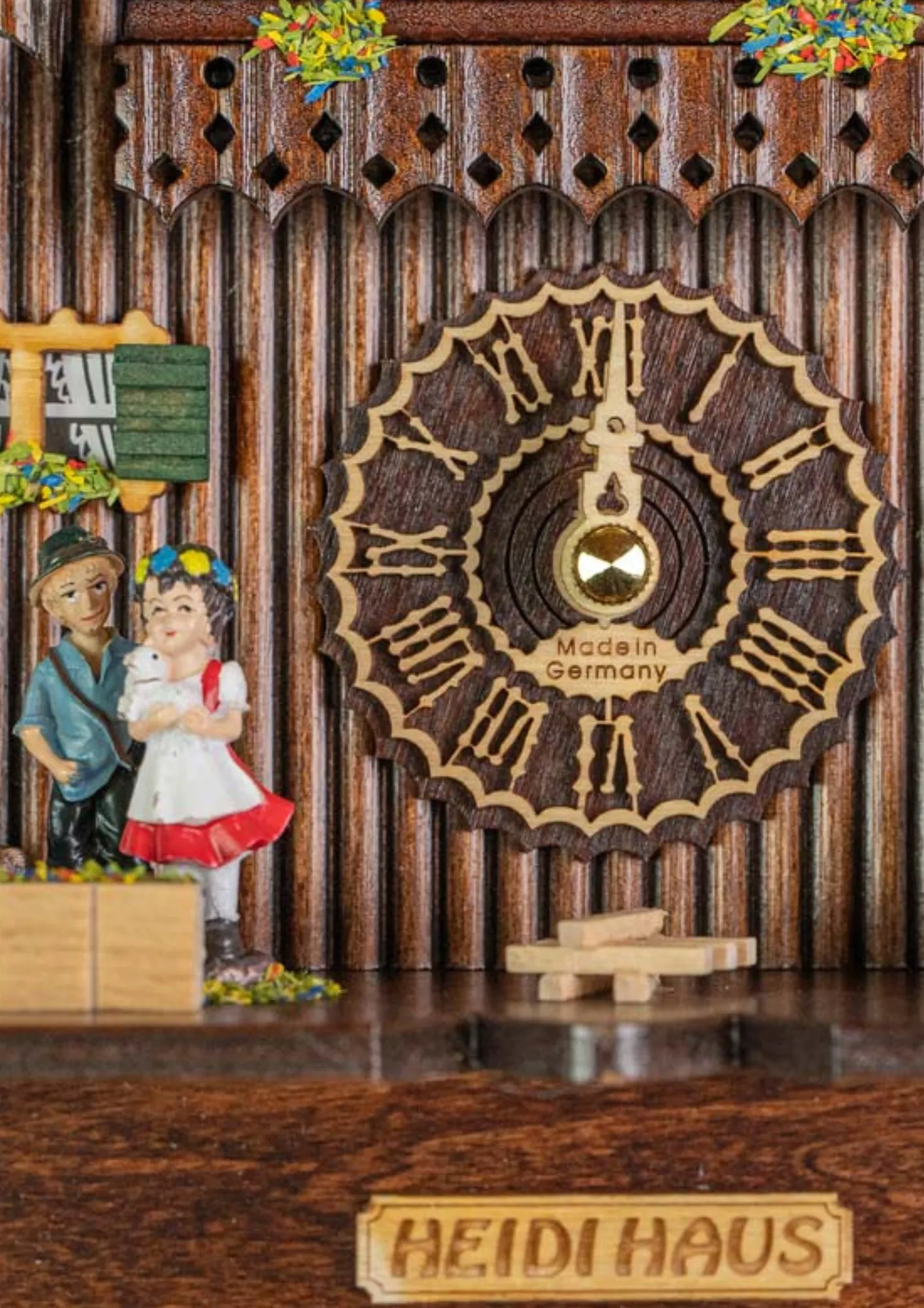 Chalet Battery Operated / Quartz Cuckoo Clock following Heidi storyline and plays music made by Hönes
